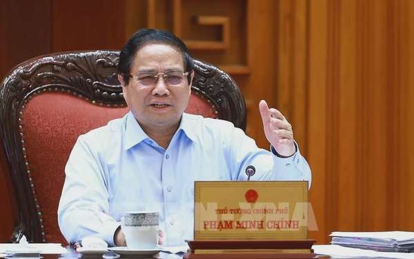 Thủ tướng Phạm Minh Chính chủ trì họp Thường trực Chính phủ với các bộ, ngành và Đoàn đàm phán Chính phủ về các vấn đề thương mại với Hoa Kỳ. Ảnh: Dương Giang-TTXVN