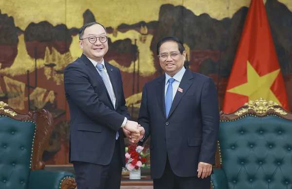 Thủ tướng Phạm Minh Chính tiếp ông Châu Gia Nghĩa, Chủ tịch châu Á-Thái Bình Dương của Tập đoàn Xây dựng Điện lực Trung Quốc - Ảnh: VGP/Nhật Bắc