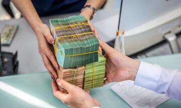 Bỏ room, tín dụng co giãn theo 'sức khỏe' ngân hàng