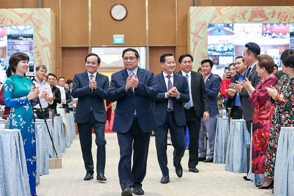Thủ tướng Phạm Minh Chính cùng các Phó thủ tướng Lê Minh Khái, Trần Lưu Quang tới dự buổi gặp mặt của Thường trực Chính phủ với đại diện doanh nhân Việt Nam (Ảnh: VGP/Nhật Bắc)