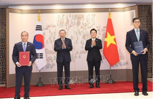 Tổng Bí thư Tô Lâm chứng kiến lễ trao các văn kiện hợp tác Việt Nam - Hàn Quốc- Ảnh 5.