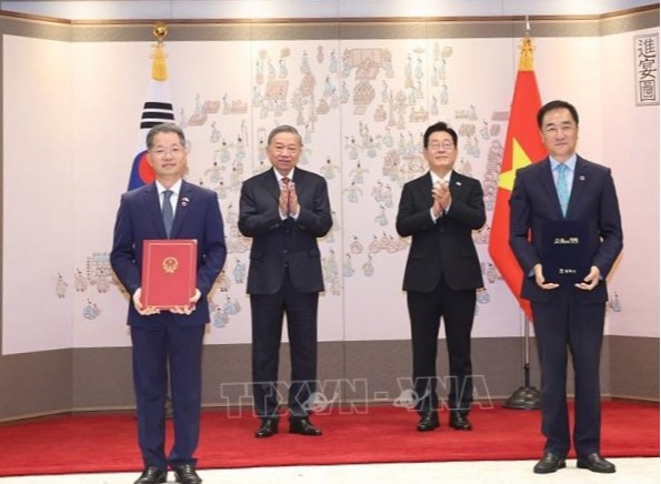 Tổng Bí thư Tô Lâm chứng kiến lễ trao các văn kiện hợp tác Việt Nam - Hàn Quốc- Ảnh 10.