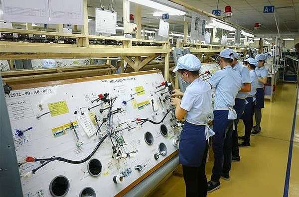 Sản xuất linh kiện điện tử tại Công ty TNHH Điện - Điện tử Mê Trần (tỉnh Vĩnh Phúc). Ảnh: Danh Lam